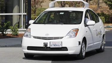 California Gov. Edmund G Brown Jr., front left, rides in a driverless car to a bill signing at Google headquarters in Mountain View, Calif., on Sept. 25, 2012. A transportation advocate says driverless cars could be ready for Canadian roads within four years, but nobody seems to be at the wheel to regulate and plan for such vehicles. THE CANADIAN PRESS/AP - Eric Risberg