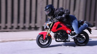 David Booth rides the 2014 Honda Grom.