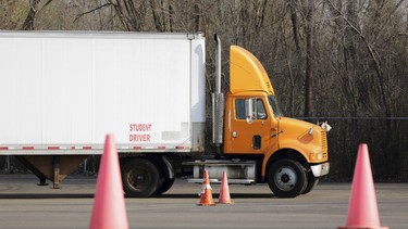 A student truck driver practises parking manoeuvres. Proper apprenticeship training is key to training skilled drivers.