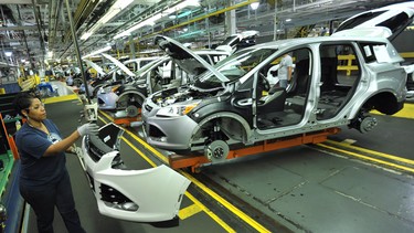 Tina Griffin at Ford’s Louisville Assembly Plant assembles the all-new Escape after an employee celebration to mark the $600 million transformation of the facility.