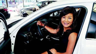 Amy Wu, a 50-year-old mother of one, relishes the customer interaction in her sales role at Regency Lexus.