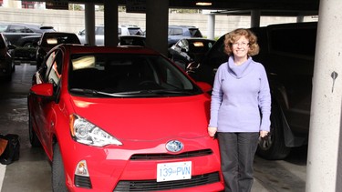 North Burnaby’s Holly McManus with the Toyota Prius C she drove as part of the Commuting Challenge.
