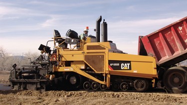 For pouring new asphalt onto highway surfaces, there is no better machine for the job than this Caterpillar AP 1055D asphalt paver.