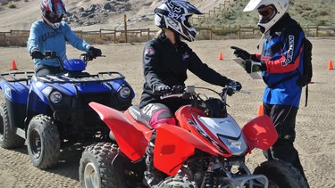 A flat parking lot might not seem like the most exciting place to learn how to handle an ATV, but it's safe and you can get a good feel for your machine.