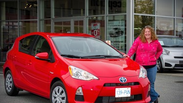 Sue Ogierman, a bus driver by trade, with a 2013 Toyota Prius c, wasn’t surprised by the great fuel economy she posted during her week with the hybrid.