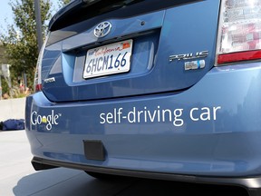 Google's Prius self-driving car is displayed at the Google headquarters on September 25, 2012 in Mountain View, California.