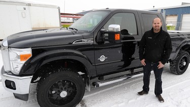 Brian Tkachuk with his F-350 diesel pickup truck in Edmonton.