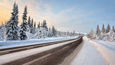 Snow covered country road in december