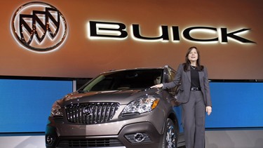 GM's Mary Barra unveils the 2013 Buick Encore at last year's North American International Auto Show in Detroit. Barra, 51, will succeed Dan Akerson as GM's CEO