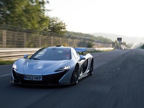 The McLaren P1 does a blazing lap on the famed Nürburgring track in Germany - setting a "record" time under seven minutes in the process.