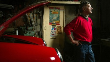 Former race car driver turned auto mechanic Horst Kroll in his Toronto repair shop in this file photo.
