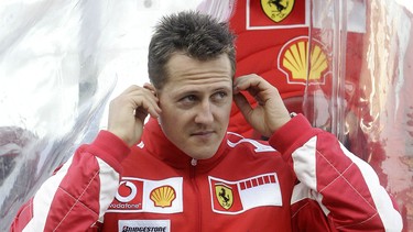 In this photo taken on February 2, 2006 German Ferrari Formula one driver Michael Schumacher is seen in the pits during a training session at the Ricardo Tormo racetrack in Cheste near Valencia. Formula One legend Michael Schumacher is in a "critical condition" in a coma after striking his head in a ski accident in the French Alps on December 29, 2013, the hospital treating him said.