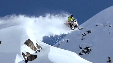 A snowmobiler catches some air in the video by the Canadian Avalanche Centre.