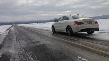 On her 1,000-kilometre road trip to Quebec City, Lisa noticed plenty of heads swivelling at roadside stops. The 2014 Mercedes-Benz CLA 250 Coupe is a sweet-looking ride with its refined Calcite White paint and those naughty 17-inch five-spoke wheels. The Bi-Xenon headlamps, swooping rear lines and rather aggressive black and silver diamond grille give the coupe a rakish look.