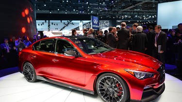 Members of the media get a look at the Infiniti Q50 Eau Rouge as it is unveiled during a press preview at the North American International Auto Show.