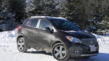 The 2014 Buick Encore AWD Leather is a capable, if underpowered, compact crossover perfect for city driving. It can easily fit into tight parking spots too small for bigger SUVs.