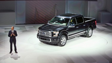 Raj Mair, group vice president at Ford Motor Company, introduces the new, aluminum Ford F-150 pickup truck at the North American International Auto Show. Ford's all-aluminum pickup truck could present some hurdles for loyal buyers. Namely, higher repair costs and higher insurance rates.