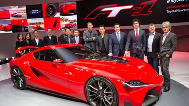 The designers of the Toyota FT-1 Concept sports car proudly stand behind their creation. Ninth from the left is Alex Shen, Studio Chief at Toyota’s Calty Design Research centre. To his left is Bill Chergosky, Calty’s manager of interior design.