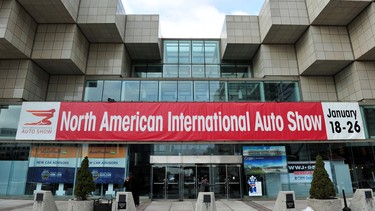 A sign outside Cobo Hall as preparations are made for the North American International Auto Show January 12, 2014 in Detroit, Michigan. The 2014 Detroit Auto Show runs  January 13-16.