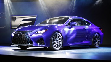 DETROIT, MI - JANUARY 14: The 2015 Lexus RCF is revealed at the press preview of the 2014 North American International Auto Show January 14, 2014 in Detroit, Michigan.
