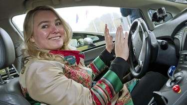 Dutch Minister of Infrastructure and Environment Melanie Schultz van Haegen sits in a self-driving Toyota on Nov. 12, 2013. The self-driving car was tested for the first time on a public road.