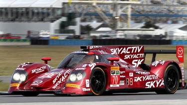 The #70 SpeedSource Mazda Skyactiv Clean-Diesel Prototype driven by Sylvain Tremblay, Tom Long and James Hinchcliffe races during practice for the Rolex 24 at Daytona International Speedway on January 23, 2014 in Daytona Beach, Florida.