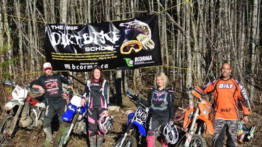 Cory Leclerc, left, Britt-Lee Kroeker, Alexandra Straub and Shaums March pose at the Motorcycle Safety Foundation (MSF) Dirt Bike School at Cat Lake near Squamish. The program is designed to build a strong foundation for riders.