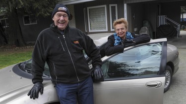 Shown here with their current car — a 2004 Chrysler Concorde XLI — Neil and Jean Martens of Abbotsford are in the market for a new car. Aiming at a price of around $20,000, they want something compact and fuel efficient with a few creature comforts.