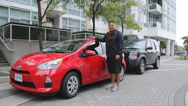 Ian Wong with the Commuting Challenge Prius V and his LR3.