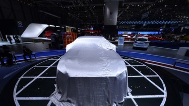 A Ford Mustang is prepared ahead of the opening day of the 84th International Motor Show which will showcase novelties of the car industry on March 3, 2014 in Geneva, Switzerland.