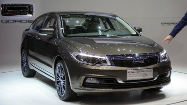 A Qoros 3 Sedan is displayed as a European premiere at the Chinese car maker's booth during the Geneva Motor Show on March 5, 2013.