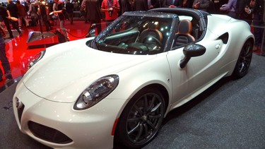 Just when we thought the 4C couldn't get any prettier, Alfa Romeo removed the roof and gave us the 4C Spider.