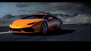 Need to escape an apocalyptic thunderstorm? The Lamborghini Huracan is the car for you.