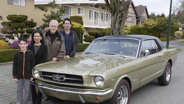 Callum, Carole, Clarence and Derek Hansen with the 1965 Mustang the family has owned for 50 years.