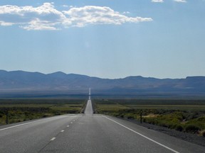 U.S. Route 50 in Nevada has been dubbed the loneliest road in America. Surrounded by desolate desert and with nothing but miles of asphalt ahead, it's easy to see why this stretch of highway earned the moniker.