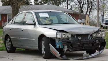 A Hyundai Elantra sits wrecked after a crash.