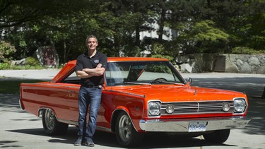 Jason Heard with the 1966 Satellite that’s been painted in A&W orange and will be auctioned off at the Vancouver Collector Car Show & Auction with proceeds going to the MS Society.