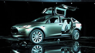 Tesla has announced deliveries of its upcoming Model X crossover have been postponed until 2015.