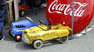 Some great signs and old pedal cars at the Coastal Swapmeet at the Tradex in Abbotsford.