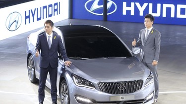 Hyundai's new front-wheel-drive premium sedan, code-named AG, is displayed during the 2014 Busan International Motor Show, in Busan, South Korea, 29 May 2014.  EPA/YONHAP SOUTH KOREA OUT