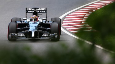 Jenson Button of Great Britain and McLaren drives during practice ahead of the Canadian Formula One Grand Prix at Circuit Gilles Villeneuve on June 6, 2014 in Montreal, Canada.