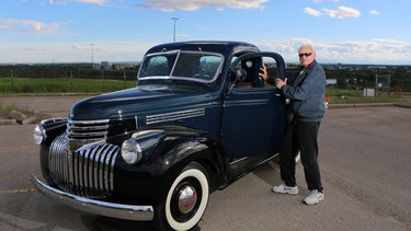 Bill Kwas stands with his 1941 Chevrolet truck  that he and his son spent five years restoring.