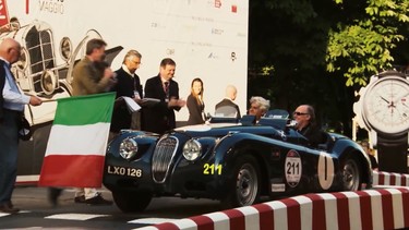 Jay Leno and Ian Callum drive a 1951 Jaguar XK120 at Mille Miglia.