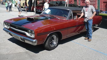 Jim Dunkley brought an identical 1970 Plymouth GTX with a massive 440 cubic inch engine and four speed transmission to the auction  identical to the one his mother bought him when he was 17.