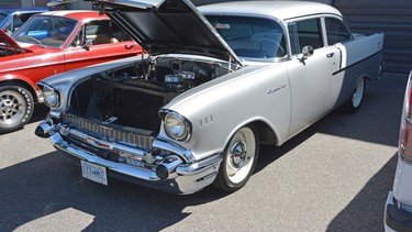 Ric Robinsons latest ride is a 1957 Chevy with with the factory correct 57 dual four set up.