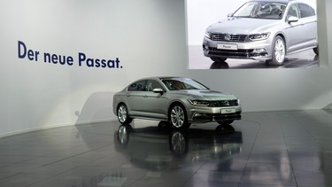 A new Passat model of German car manufacturer VW is presented in Potsdam, eastern Germany, on July 3, 2014.