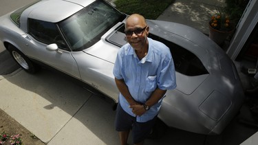 George Talley, 71, poses with his 1979 Chevrolet Corvette in Detroit, Tuesday, July 1, 2014. Talley had believed the sports car was long gone after he parked it in Detroit in 1981 and it was stolen. On June 13, 2014 he received a  phone call from auto insurer AAA telling him his car was at a police station in Mississippi, about 840 miles southwest of Detroit.