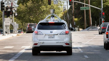 Google's driverless car navigates along a street in Mountain View, Calif.