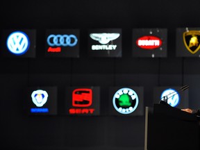 The head of Volkswagen's supervisory board, Ferdinand Piech, delivers a speech in front of VW brand logos during the general assembly of shareholders of Europe's biggest carmaker in this 2009 file photo.