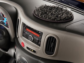 This ... thing is part of a $255 "Interior Designer Kit" for the Nissan Cube.